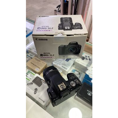 imagem do produto Canon EOS SL2 com lente EF-S 18 55mm IS STM Usada - Aprox. 17k - Canon